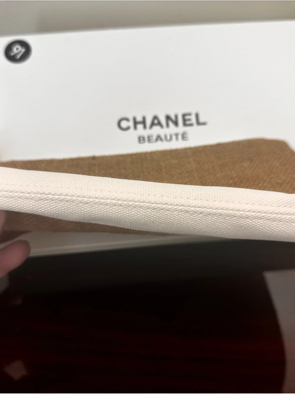 CHANEL Brown and White Woven Cosmetic Pouch with Logo